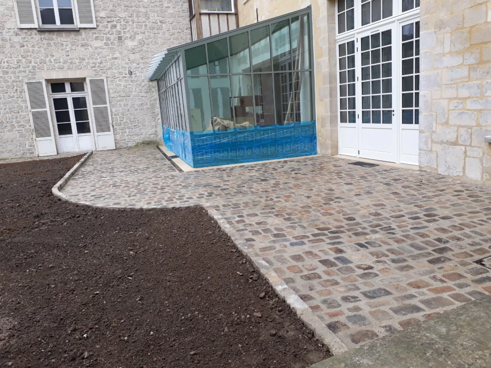 Terrasse en pavés anciens