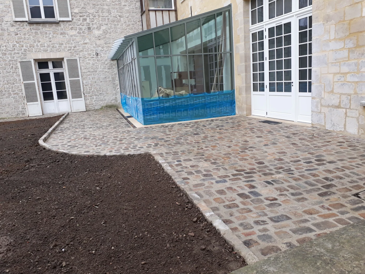 Terrasse en pavés anciens